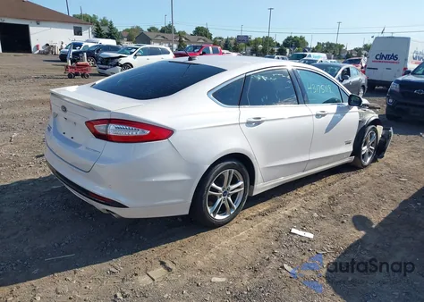 2016 Ford Fusion Energi Titanium from USA, damaged, VIN 3FA6P0SU6GR357415